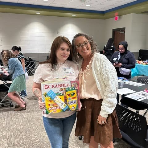 A Parent Party attendee winning a prize